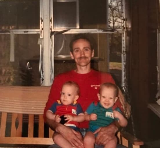 two brothers with their dad